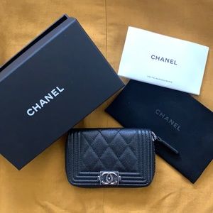 Chanel Boy zip around coin purse wallet in caviar leather.  Brand new. Pristine.